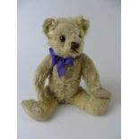 A gold mohair fully jointed Teddy Bear with original felt pads. Probably Farnell. 11in H