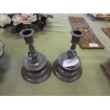 A pair of 17th Century style pewter Candlesticks on domed bases, 7in
