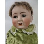 A Catterfelder Puppenfabrik character Doll with open mouth, brown sleeping eyes and five piece body.