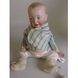 A Kammer and Reinhardt character Kaiser baby Doll with painted eyes, five piece baby body with