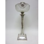 A George V silver Oil Lamp with cut glass reservoir on fluted column with corinthian capital on