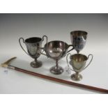 A George V small silver two handled Trophy, Sheffield 1930, three plated Trophies, a Victorian