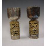 A pair of Elizabeth II silver limited edition Chalices/Cups with pierced scroll cylindrical stem