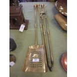 A set of three 19th Century brass Fire Implements with bulbous knop finials