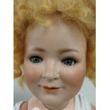 A Princess Elizabeth bisque headed Doll impressed Porzellan Fabrik Burgrub, A/F, arms replaced, 21in