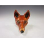 A cast iron Fox Mask with painted details, 6in