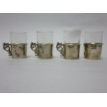 Four George V silver mounted Spirit Tots, Birmingham 1911, one handle A/F