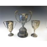 An Edward VII silver Trophy leafage engraved, Birmingham  1907, and two silver two handled Trophies