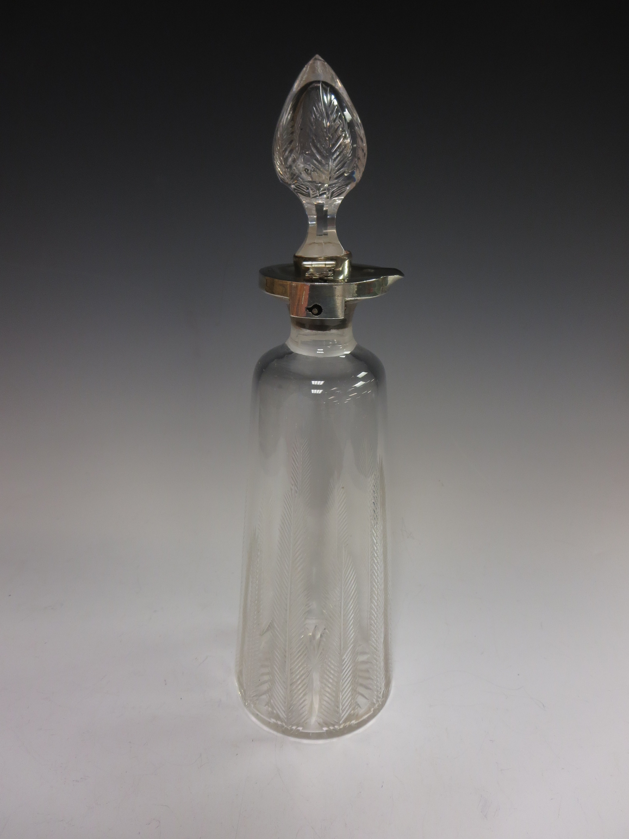 An Edward VII silver mounted cut glass Decanter with locking mechanism, leafage and star design, - Image 2 of 2