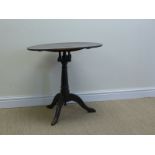 A late 18th Century oval oak Pillar Table with bird cage support on tapering column and tripod base