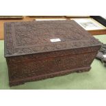 An Indian or Burmese carved Box with fitted interior of mirror and covered compartments, 17 1/2in W