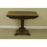 A William IV rosewood Card Table with D shape fold-over top on turned column, clover leaf base
