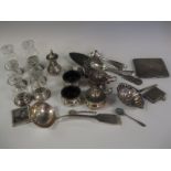 Six engraved glass Condiments with sterling silver bases and sundry silver items including Sauce