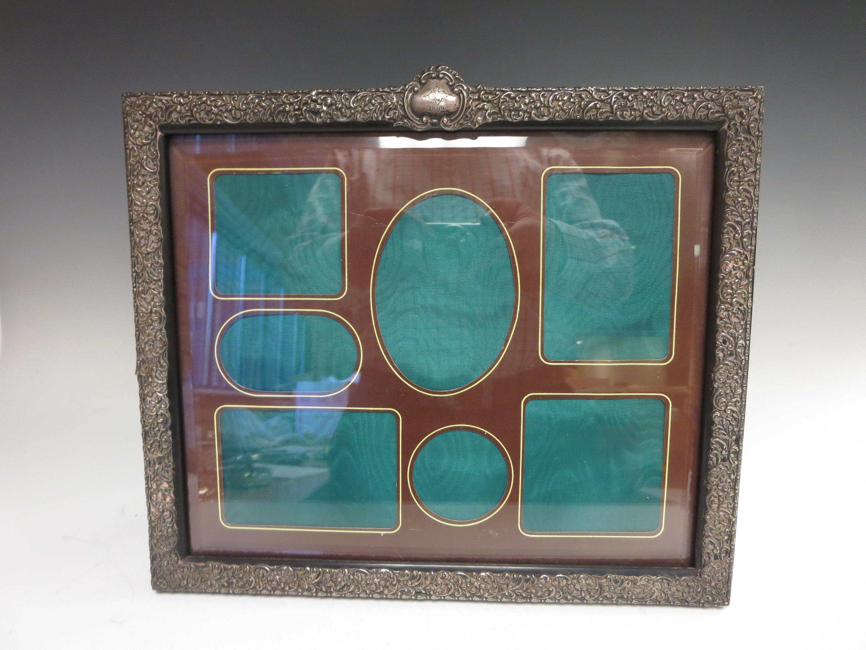 A Victorian silver mounted large Photograph Frame with scroll embossing, Birmingham 1899, 11 x 13in