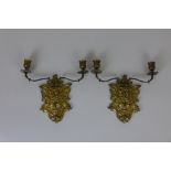 A pair of early 19th Century gilt brass Candle Sconces, the back plates in the form of the Green