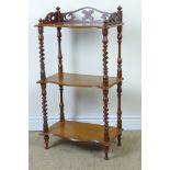 A Victorian walnut three tier Whatnot with serpentine front and spiral supports 3ft 1in H