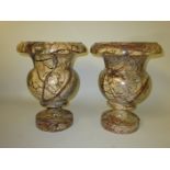 A pair of red veined marble Conservatory Urns in square bases, 12in