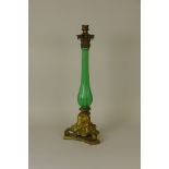 A 19th Century gilt-brass and green glass Table Lamp with ribbed glass baluster column and