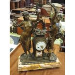 A 19th Century figural Mantel clock having circular dial flanked by two female figures on a marble