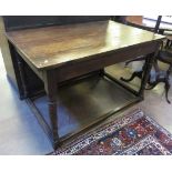 An antique oak Centre Table with plank top on turned and square legs and square stretchers, 3ft
