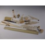 A quantity of Stanhope Viewers, Glove Stretchers, Rulers, Needlecase, lidded Pots etc