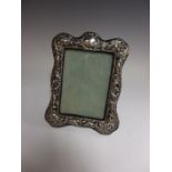 An Edward VII silver Photograph Frame with scroll embossing, Birmingham 1903, 8 x 6in