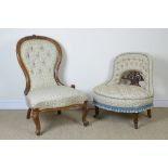 A Victorian walnut framed Nursing Chair with floral swag button upholstered back, on cabriole