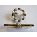 A circular Sapphire and Cultured Pearl Brooch set alternating circular-cut sapphires and cultured