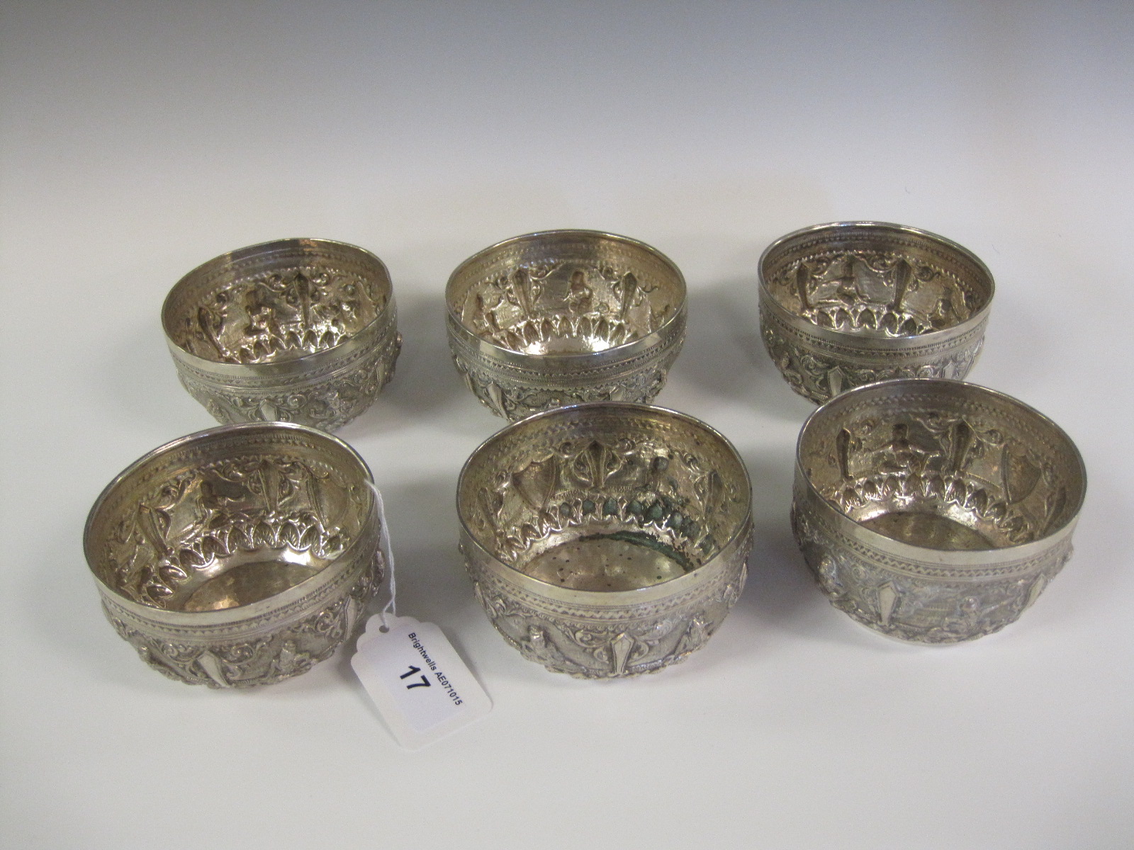 Six Eastern silver circular Bowls embossed frieze of figures and initial M within shield shape - Image 2 of 2