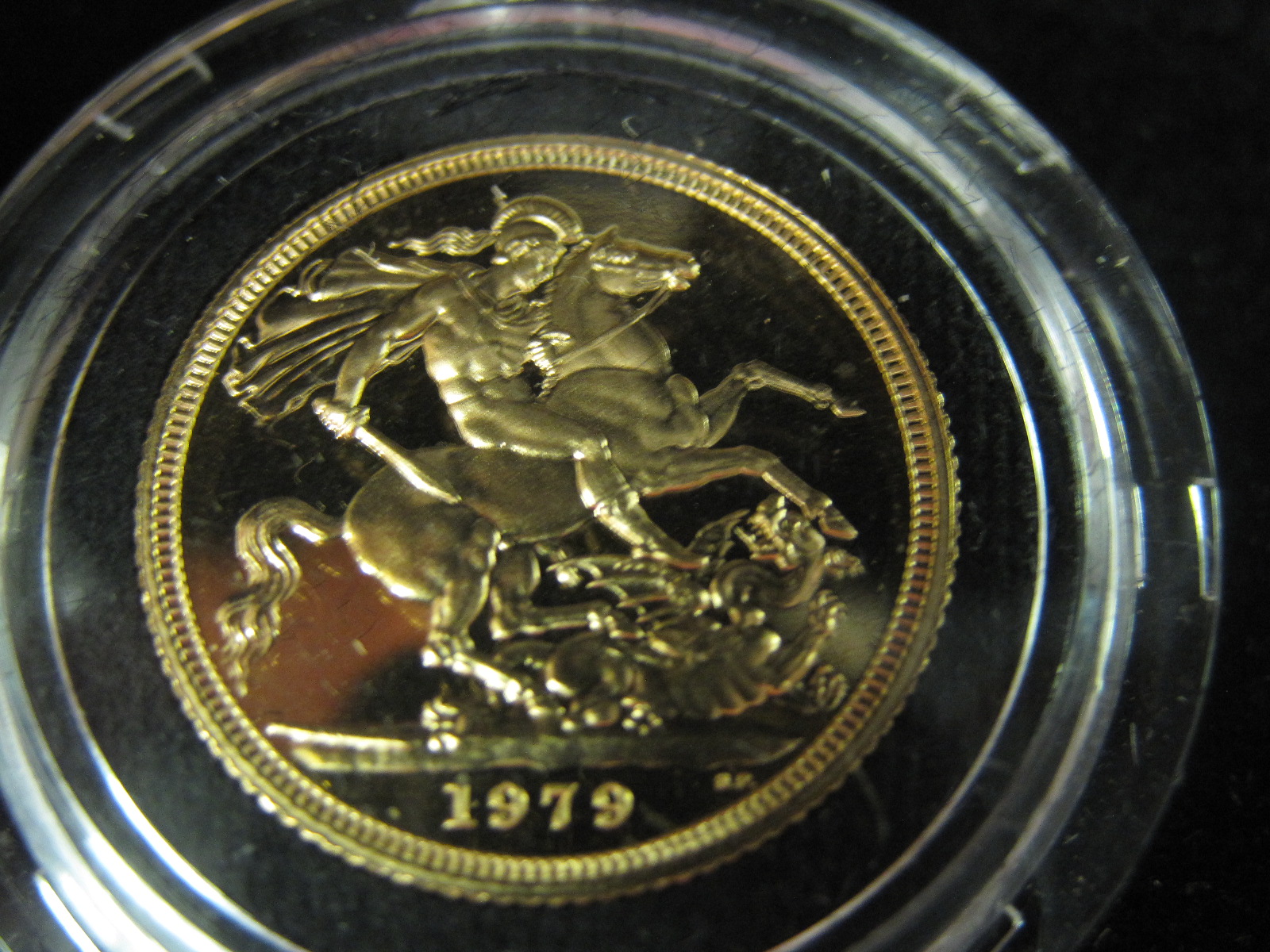 An Elizabeth II Proof Sovereign, 1979, in blue case of issue