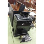 A Victorian black painted tin Magic Lantern with brass mounts, in black Box