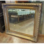 A reproduction gilt framed bevelled Wall Mirror with leafage moulded design, 44in W x 40in H