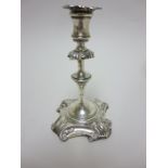 A Victorian silver Taperstick with knopped stem, presentation inscription on shaped square base,