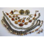 A Collection of costume Jewellery including simulated pearls, white metal rope twist chain, amber