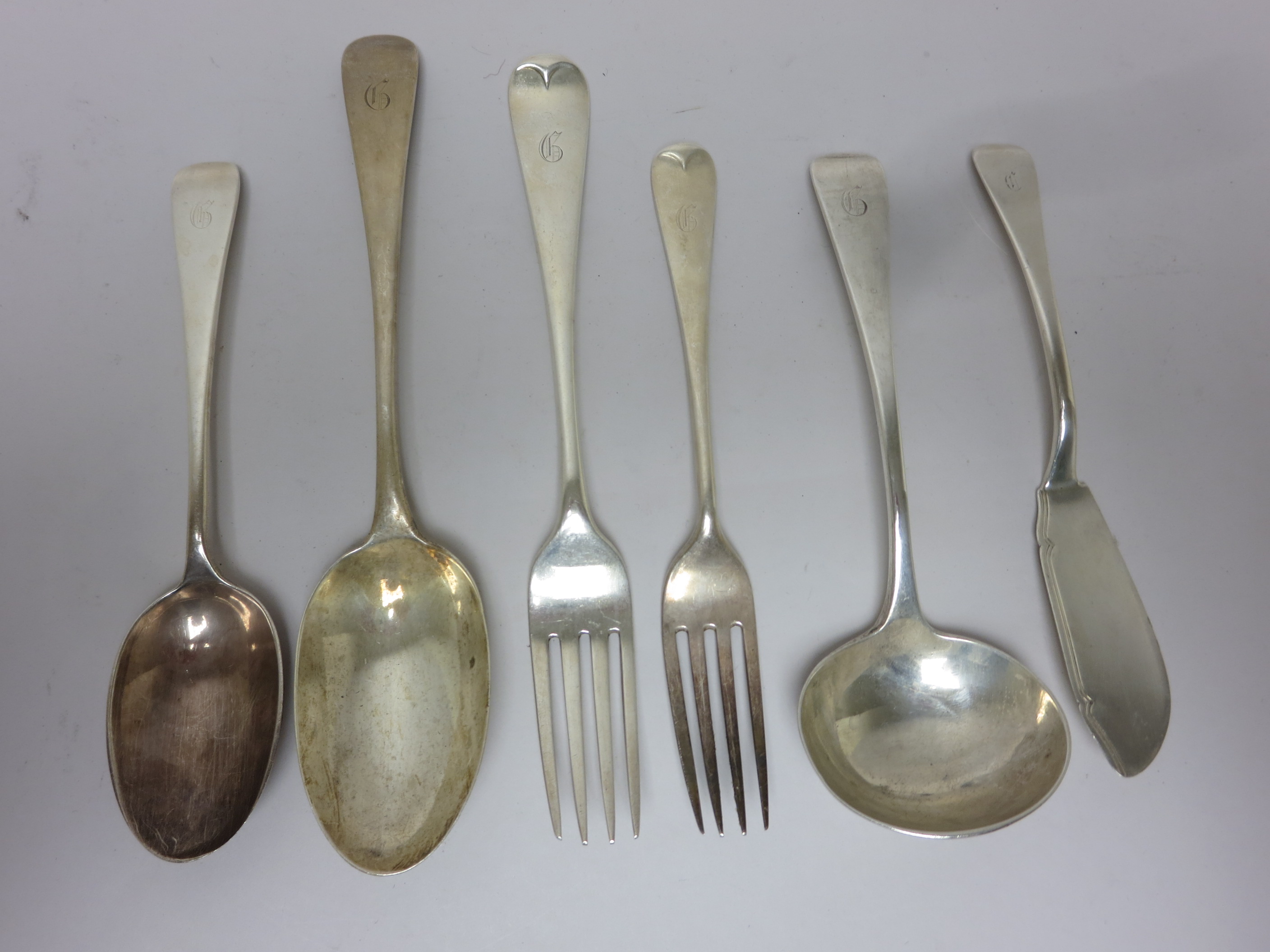 A part set of Edward VII silver Cutlery engraved initial G, London 1909, viz 12 Dinner Forks, plus