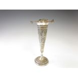 An Indian silver Vase embossed and chased figures, flared rim, circular base,  8 1/4in