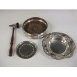 A modern silver Coaster with turned wooden base, London 1985, a Continental Dish and Strainer,