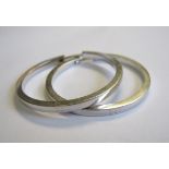 A pair of white gold hinged Hoop Earrings, stamped 750