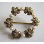 A Diamond and Seed Pearl Wreath Brooch