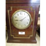 A Eureka Clock Co Ltd mahogany Mantel Clock "1000 day electric clock", the circular dial with arabic