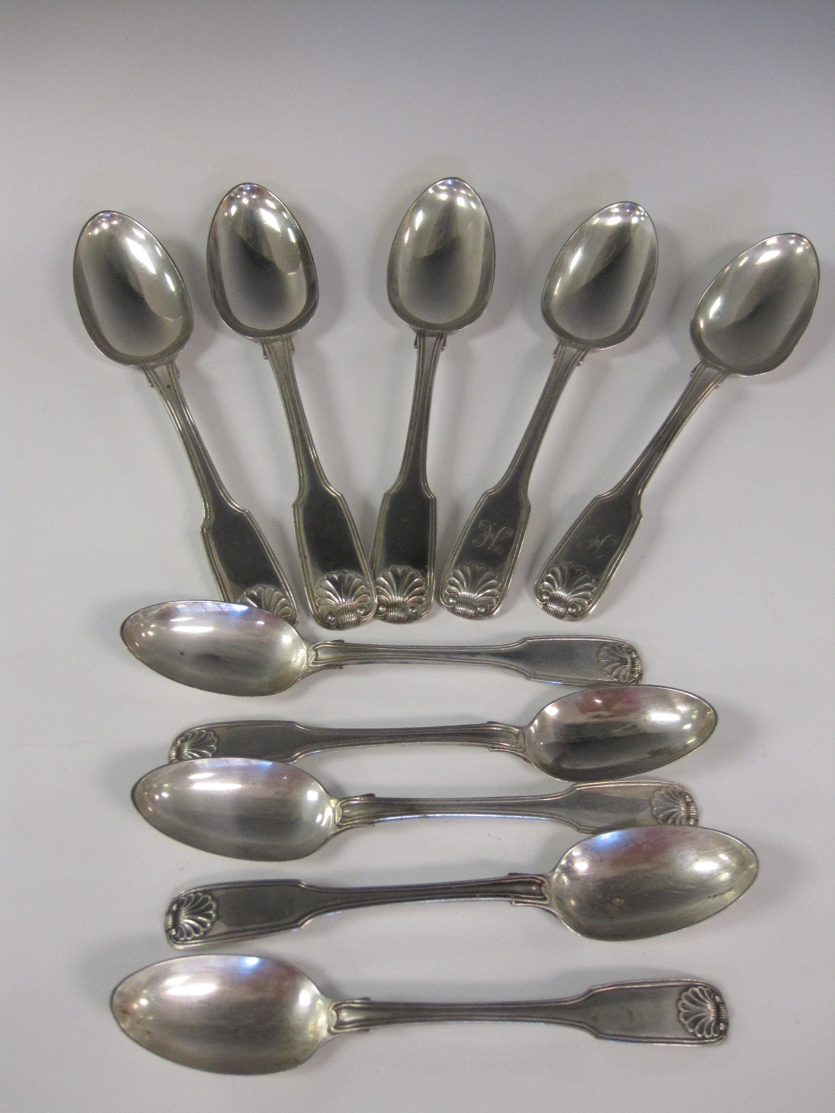 Five William IV silver Dessert Spoons fiddle and shell pattern, Chester 1836 and five Teaspoons