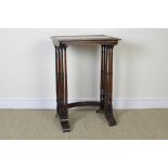 A nest of three Victorian rosewood Occasional Tables with oblong tops, turned column supports, bowed