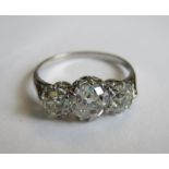 A Diamond three stone Ring claw-set graduated old-cut stones, estimated total diamond weight 2.