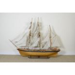 A scale model of a three masted Tall Ship of clinker built construction, 6ft L x 4ft 7in H