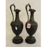 A pair of antique spelter wine ewers dec