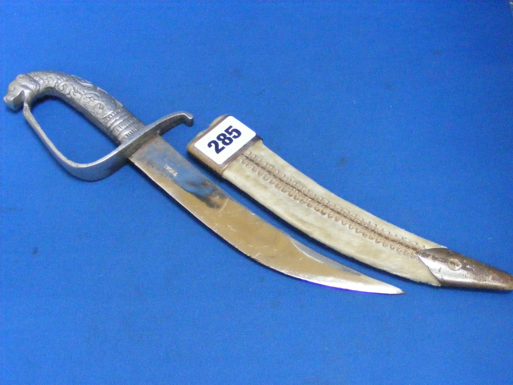 An old Indian dagger, the metal handle i