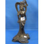 A bronzed figure of a lady in the Art No