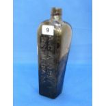 An antique Continental glass gin bottle,