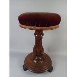 A Victorian Mahogany Swivel Piano Stool