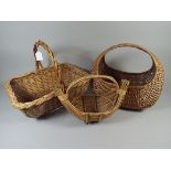 A Collection of Three Wicker Shopping Ba